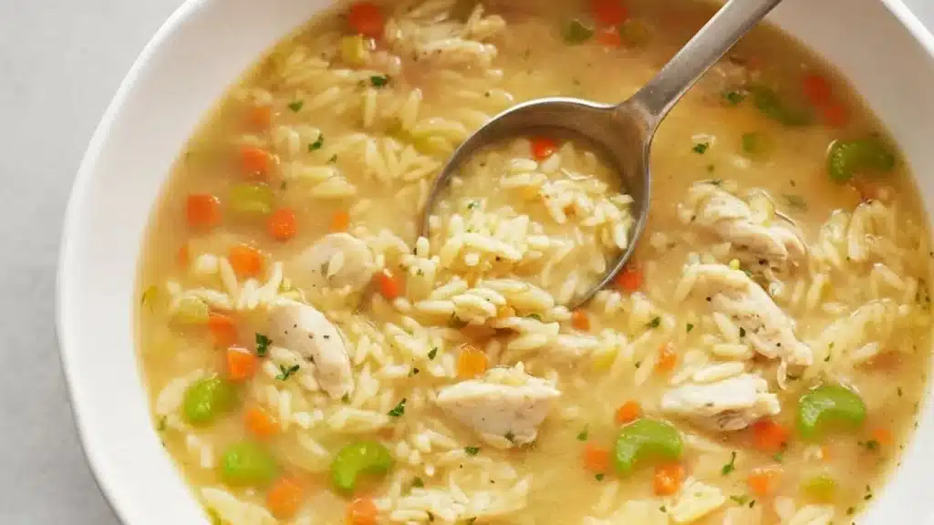 Hearty lemon chicken orzo soup with fresh parsley