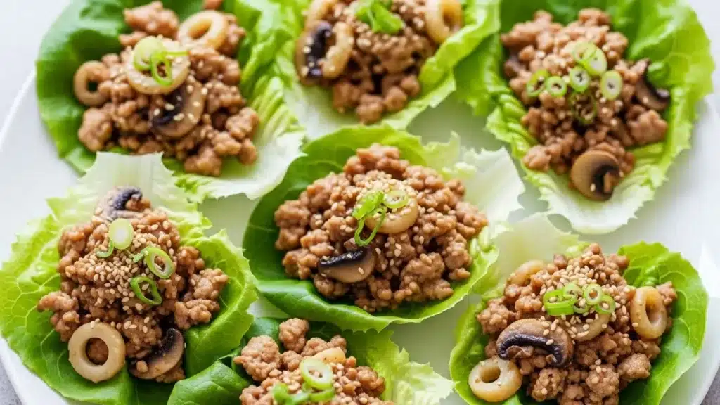 Fresh chicken lettuce wraps with hoisin sauce and green onions